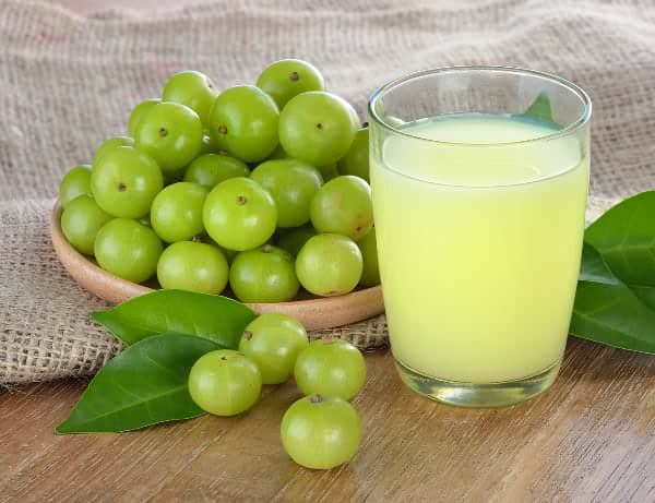 Indian gooseberries with healthy drink