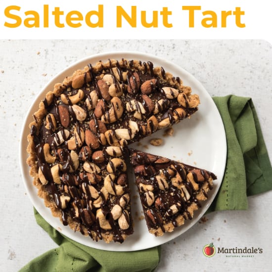 holiday tart with chocolate and salted nuts in an easy pretzel crust