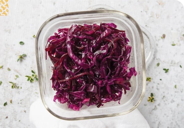 Fermented beets and cabbage in a glass dish