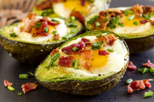 Avocado with egg and bacon is a great keto-friendly snack